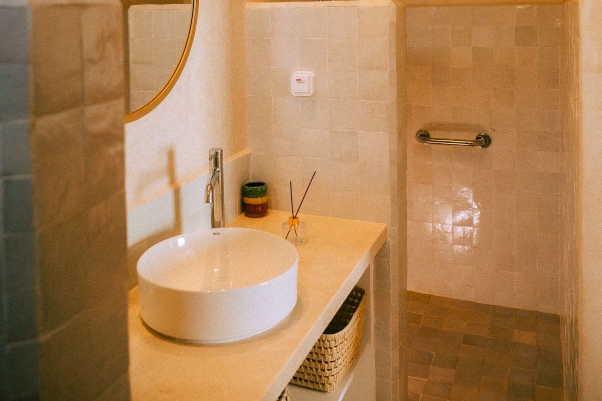 Bathtub, hair dryer, towels, soap
