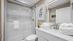Shower, jetted tub, towels