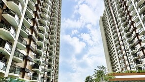 A high-rise residential building with a swimming pool in the foreground. - Levi & Moon Relax and Chill (Pasay)