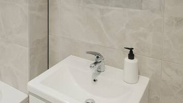 Hair dryer, towels, soap, toilet paper