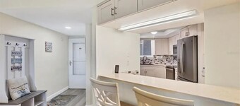 Burnt Store Marina 2 Bed/2 Bath beautiful 2nd Flr condo. Lanai golf course view.