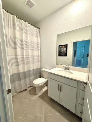 Hair dryer, towels, soap, toilet paper
