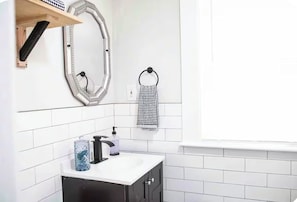 Hair dryer, towels, soap, toilet paper