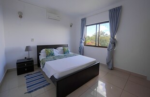Apartment, Balcony, Ocean View | In-room safe, laptop workspace, iron/ironing board, free WiFi