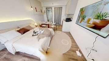 Family Double Room, City View | Desk, laptop workspace, blackout curtains, soundproofing
