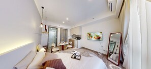 Family Double Room, City View | Desk, laptop workspace, blackout drapes, soundproofing - SOHO Suites KLCC by noon (Kuala Lumpur)