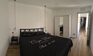 2 dormitorios, tabla de planchar con plancha, wifi gratis y ropa de cama