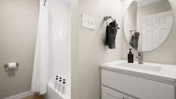 Shower, towels, soap, toilet paper