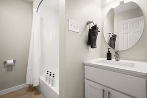 Shower, towels, soap, toilet paper