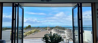 Spectacular views from this lovely sunny home in Castor Bay.