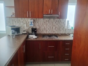 Fridge, microwave, coffee/tea maker, electric kettle