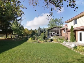 Terrace/patio - Grand Bend Cottage. Private 26 acres of magical landscape & exclusive pond. (Dashwood)