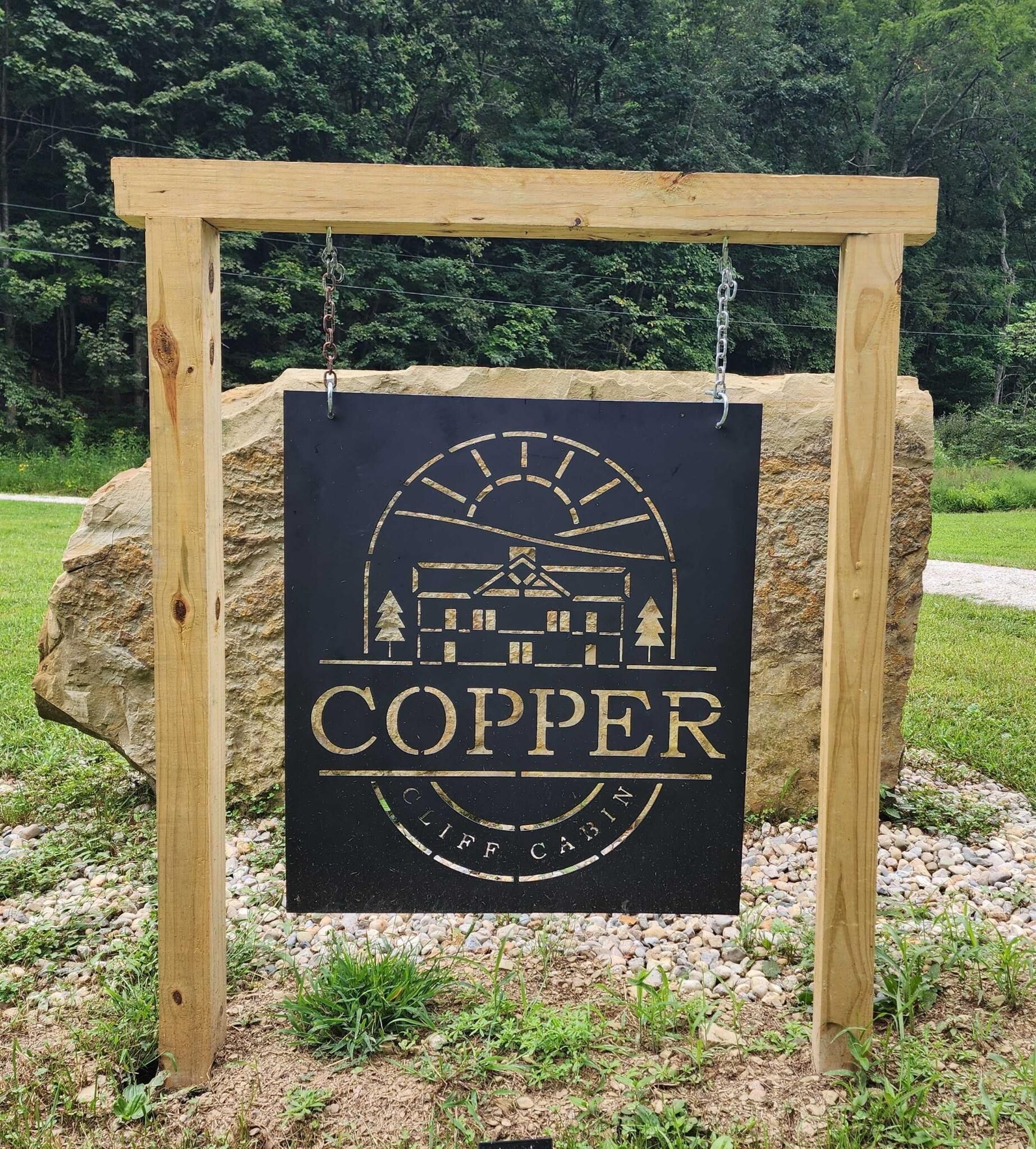 Charming entrance sign welcomes you to Copper Retreat