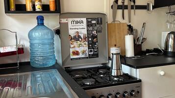 Fridge, microwave, oven, dining tables