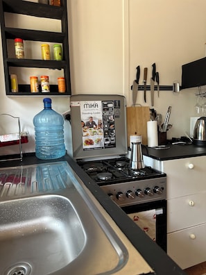 Fridge, microwave, oven, dining tables