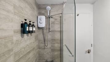 Hair dryer, towels, soap, shampoo