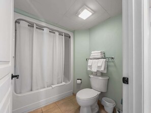 Shower, hair dryer, towels, shampoo