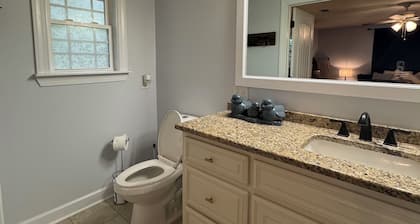 Peaceful Suite with private deck, master bedroom/bathroom with walk in shower.
