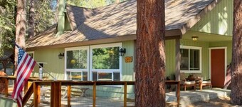 One acre with a fire pit, kids play area, treehouse, zipline, pets welcome