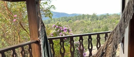 Deluxe Suite, Balcony, Mountain View | Individually decorated, iron/ironing board, free WiFi