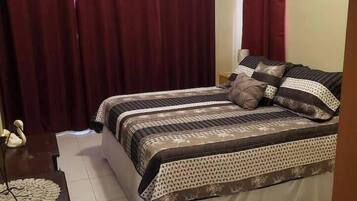 Basic Triple Room, Balcony, Garden View | Iron/ironing board, free WiFi
