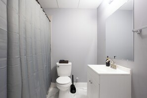 Hair dryer, towels, soap, toilet paper