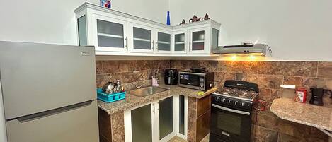 Frigorífic, microones, forn i placa de cuina