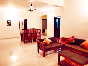 Superior Apartment, Balcony | Living area | TV - Centur Apartments (Changanassery)