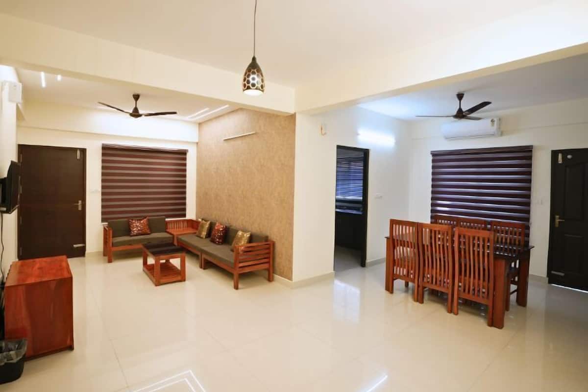 Premium Suite, 3 Bedrooms, Balcony, City View | Living area | TV