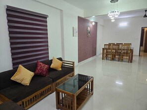 Executive Apartment, 2 Bedrooms, Balcony, City View | Living area | TV - Centur Apartments (Changanassery)