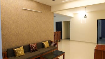 Premium Suite, 3 Bedrooms, Balcony, City View | Living area | TV