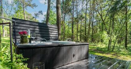 Romantic Secluded Cabin with Private Waterfall, Hot Tub, Soaking Tubs & Fire Pit