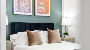 1 bedroom, desk, iron/ironing board, travel crib