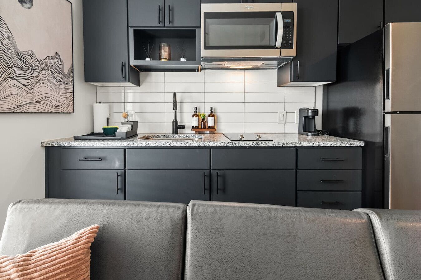 Fridge, microwave, stovetop, coffee/tea maker