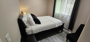 2 slaapkamers, een strijkplank/strijkijzer, gratis wifi