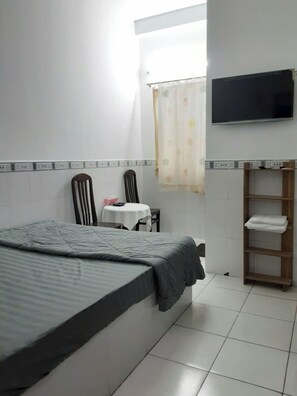 Basic Double Room Single Use | In-room safe, desk, laptop workspace, blackout drapes