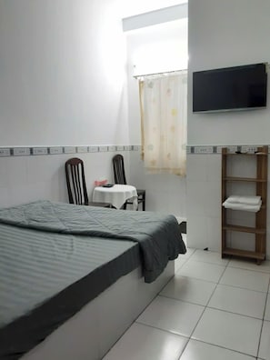 Basic Double Room Single Use | In-room safe, desk, laptop workspace, blackout drapes
