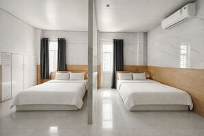 Superior Quadruple Room | In-room safe, desk, laptop workspace, blackout curtains