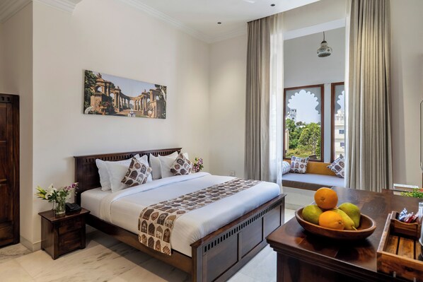 Imperial Room With Jharokha | Premium bedding, desk, laptop workspace, free WiFi