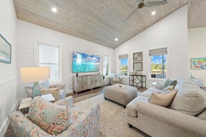 Signature House, 4 Bedrooms, Balcony, Garden View | Living room | 50-inch Smart TV with digital channels