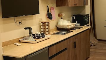 Family Room, Garden View | Desk, blackout drapes, soundproofing, iron/ironing board