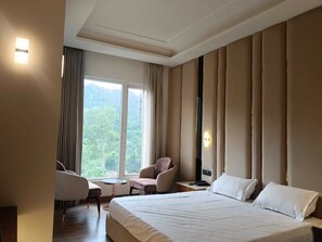 Super Deluxe Room With Mountain View | Premium bedding, free WiFi, bed sheets - Hotel Maharaja Crest (Katra)