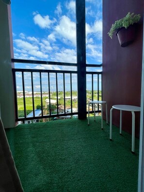 Comfort Studio, Balcony, Garden View | Balcony view - Modern Retreat with Private Balcony (Lapu-Lapu)