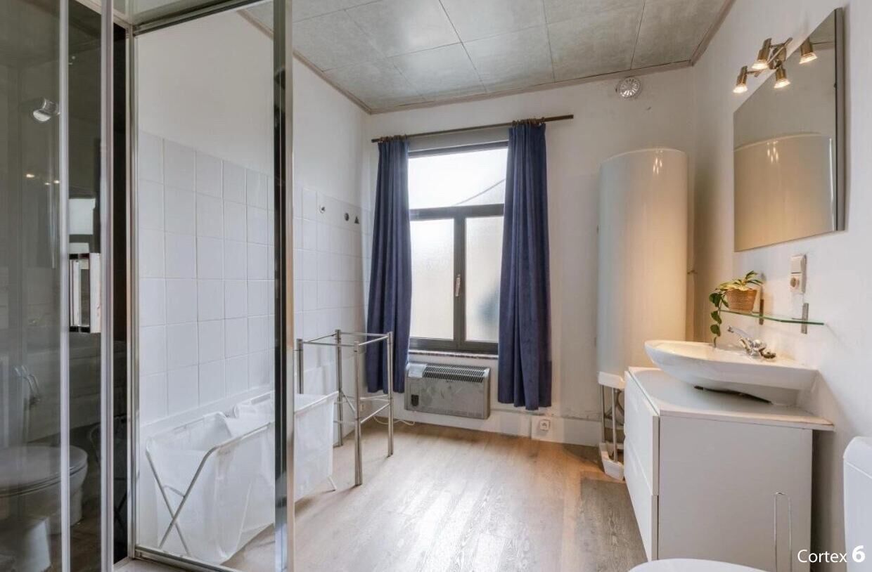 Shower, hair dryer, towels, toilet paper