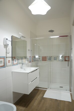 Classic Triple Room, Non Smoking | Bathroom | Shower, hair dryer, towels, soap