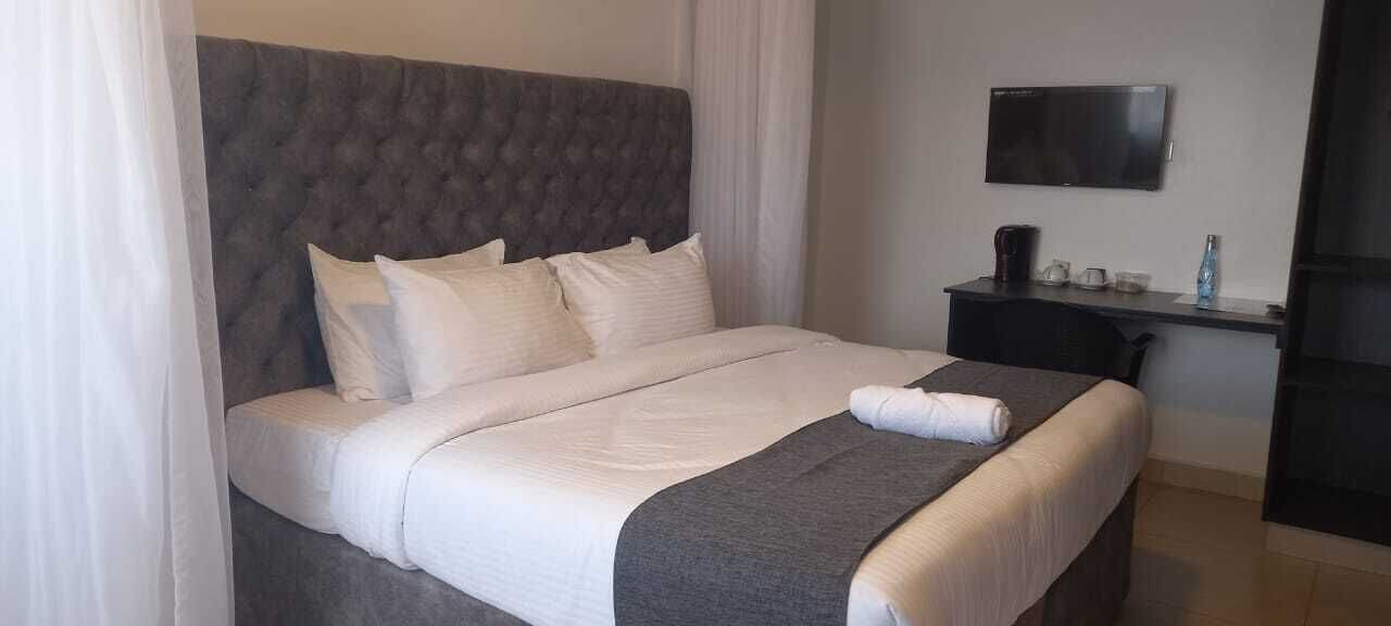 Habitació doble Deluxe, vistes a la ciutat | Wifi gratuïta i roba de llit 