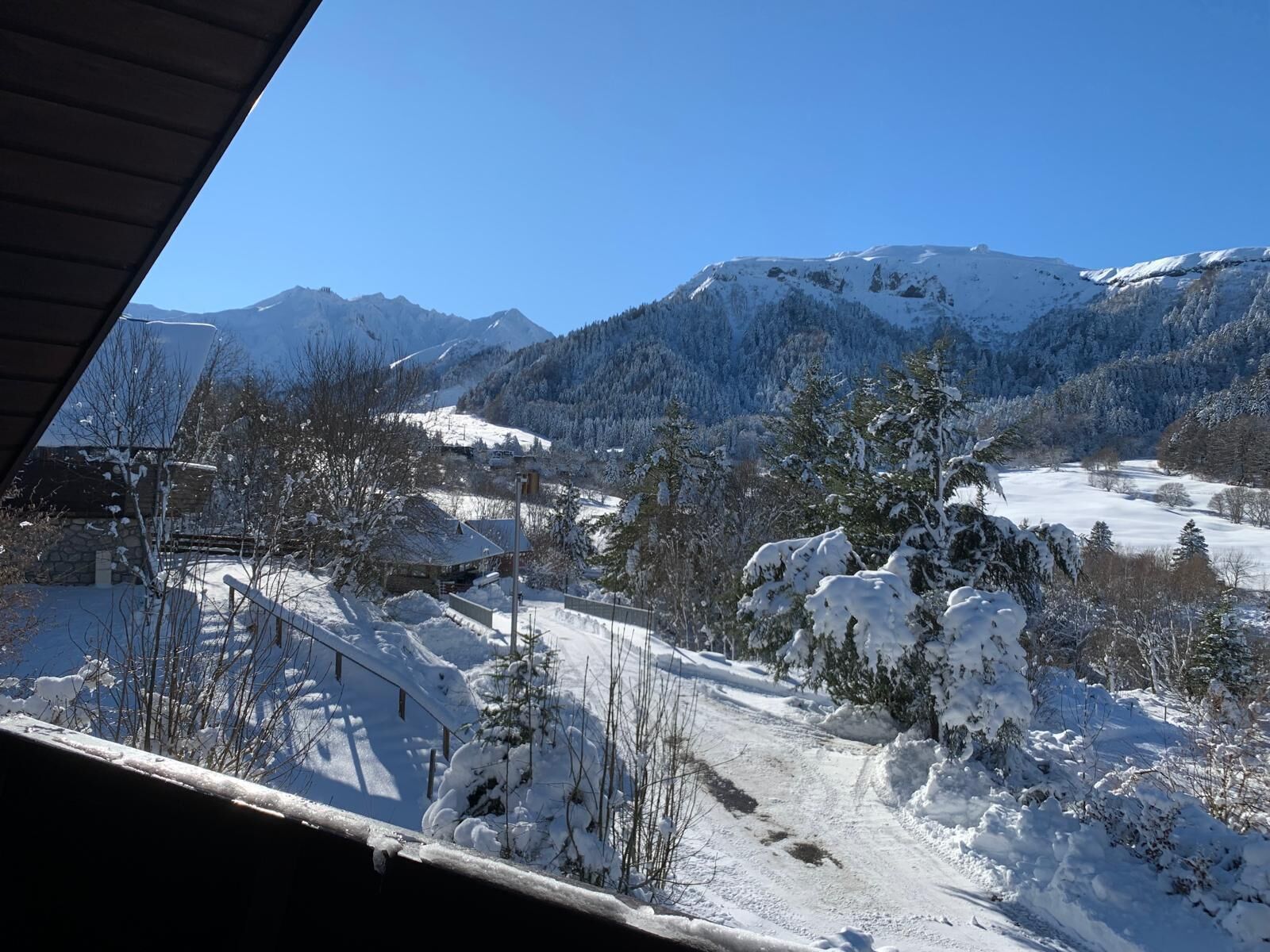 A snowy mountain landscape with a clear sky.
