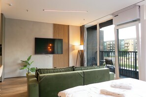 Studio Deluxe, balcon, vue parc | Coin séjour