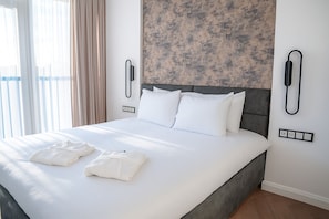 Blackout drapes, soundproofing, iron/ironing board, free WiFi