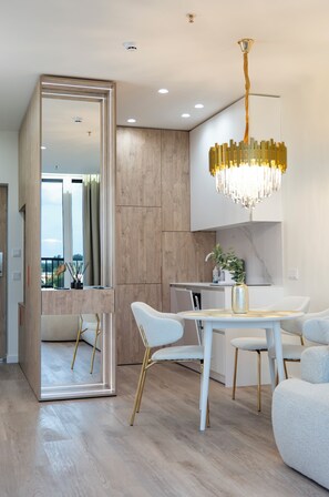 Deluxe Apartment, Balcony, Park View | Living area | 90-cm flat-screen TV with digital channels